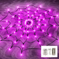 Purple glowing spider web Halloween lights displayed as a spooky wall decoration