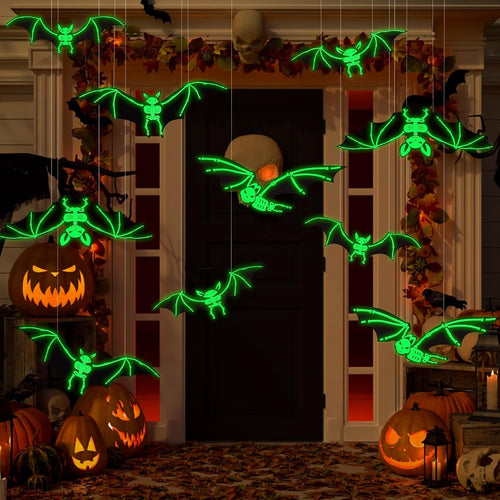 12-piece glowing skeleton bat swarm hanging across a Halloween porch